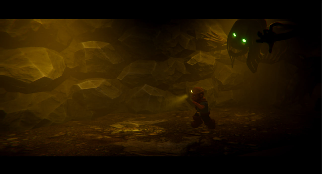 A creature hunts a miner in a dark cave